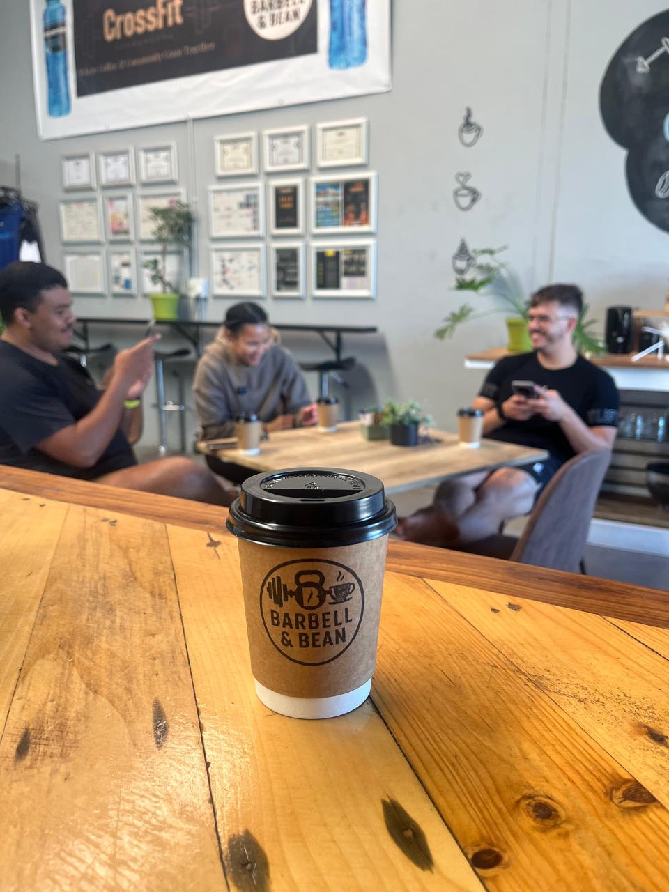 Members enjoying coffee at Barbell & Bean
